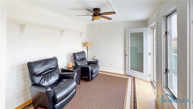 2109 Ottawa River Rd Unit 3C, Toledo, OH 43611 - living area with a ceiling fan and light carpet