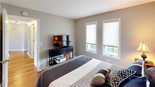 2109 Ottawa River Rd Unit 3C, Toledo, OH 43611 - bedroom featuring light wood finished floors and baseboards