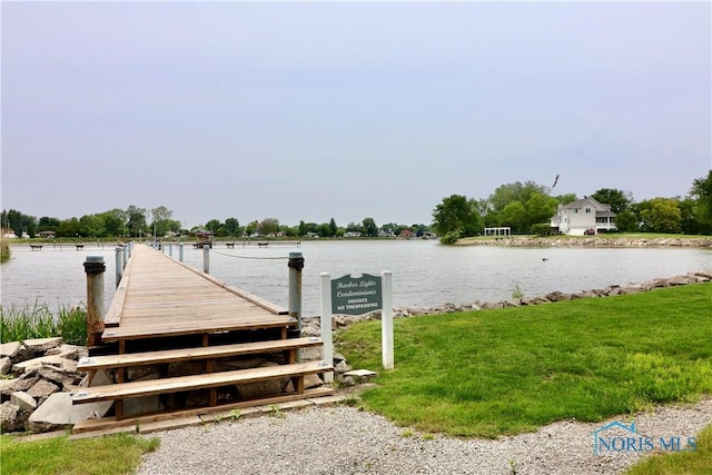 2109 Ottawa River Rd Unit 3C, Toledo, OH 43611 - dock area featuring a water view and a lawn