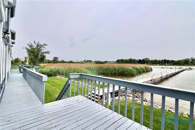 2109 Ottawa River Rd Unit 3C, Toledo, OH 43611 - wooden terrace with a view of countryside, agricultural plots, a dock, and a lawn