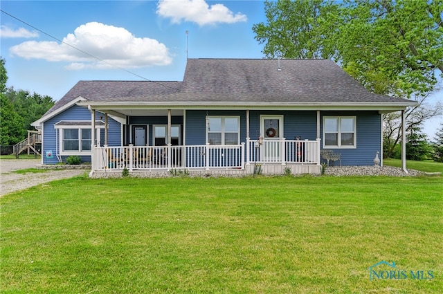 12505 Bloomlock Rd, Delphos, OH 45833 - view of front of property featuring a porch, a front yard, and a shingled roof
