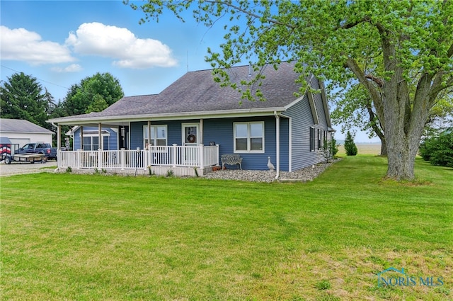 12505 Bloomlock Rd, Delphos, OH 45833 - view of front facade featuring a porch, a front yard, and roof with shingles
