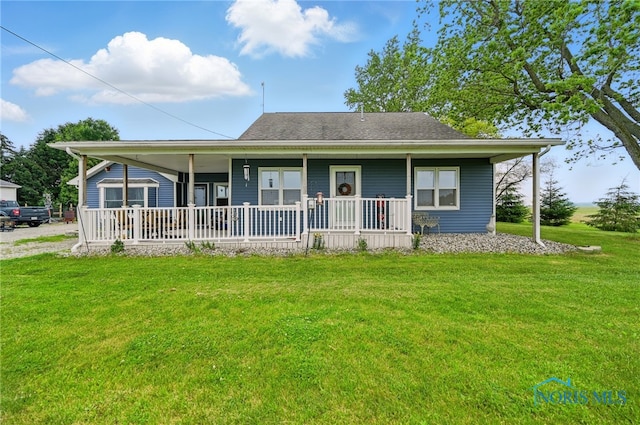 12505 Bloomlock Rd, Delphos, OH 45833 - view of front of property with covered porch, a front lawn, and a shingled roof