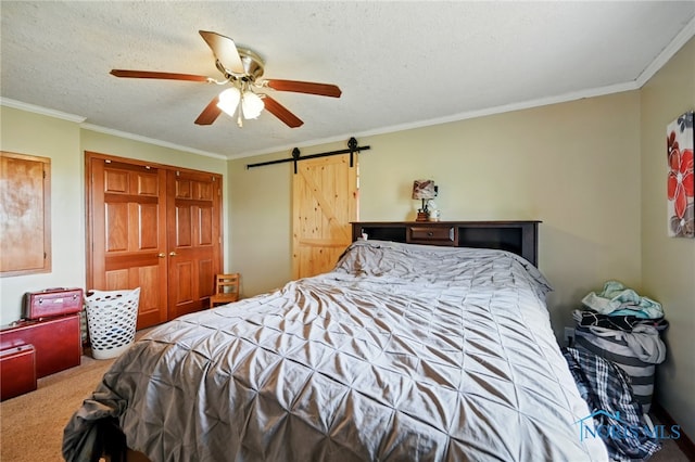 12505 Bloomlock Rd, Delphos, OH 45833 - carpeted bedroom featuring crown molding, a barn door, a closet, and a ceiling fan