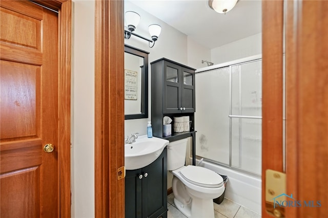 12505 Bloomlock Rd, Delphos, OH 45833 - bathroom with vanity, tile patterned flooring, and enclosed tub / shower combo