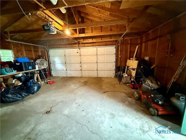 613 Maplewood Ave, Delta, OH 43515 - garage featuring a garage door opener