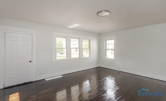 1385 Berdan Ave, Toledo, OH 43612 - empty room with wood finished floors and baseboards