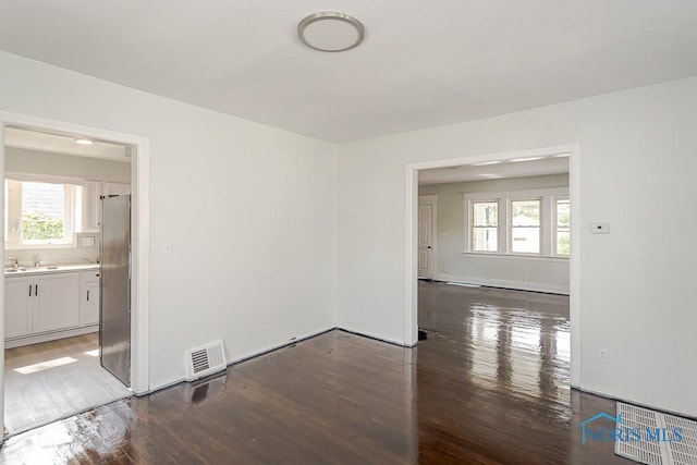 1385 Berdan Ave, Toledo, OH 43612 - empty room featuring wood finished floors and plenty of natural light