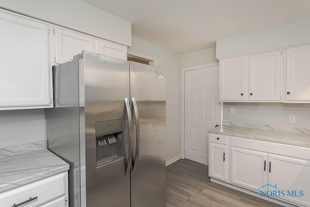 1385 Berdan Ave, Toledo, OH 43612 - kitchen featuring stainless steel fridge with ice dispenser, white cabinets, wood finished floors, and light stone countertops