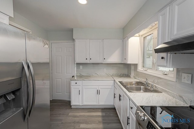 1385 Berdan Ave, Toledo, OH 43612 - kitchen featuring stainless steel fridge, white cabinets, light countertops, dark wood-style floors, and recessed lighting