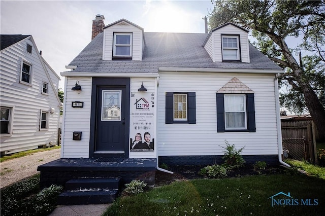 4911 Douglas Rd, Toledo, OH 43613 - view of front of house featuring a chimney