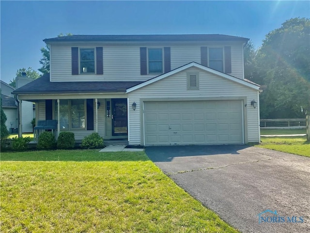 3800 Harrowsfield Rd, Sylvania, OH 43560 - traditional home featuring asphalt driveway and a porch
