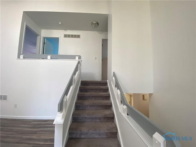 3800 Harrowsfield Rd, Sylvania, OH 43560 - staircase with wood finished floors and baseboards