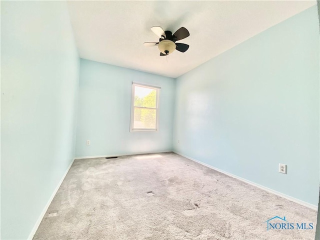3800 Harrowsfield Rd, Sylvania, OH 43560 - carpeted empty room featuring a ceiling fan and baseboards