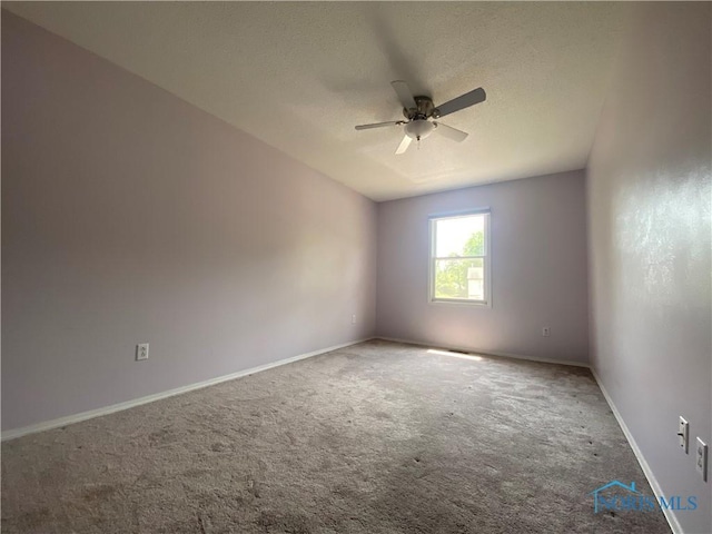 3800 Harrowsfield Rd, Sylvania, OH 43560 - carpeted empty room with a ceiling fan and a textured ceiling