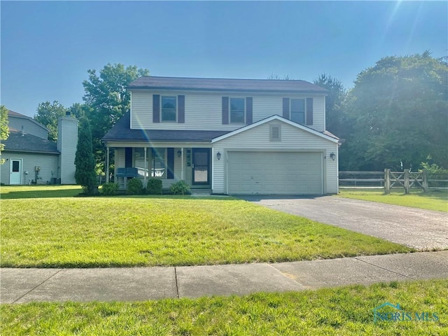 3800 Harrowsfield Rd, Sylvania, OH 43560 - traditional home featuring a porch, asphalt driveway, and a garage
