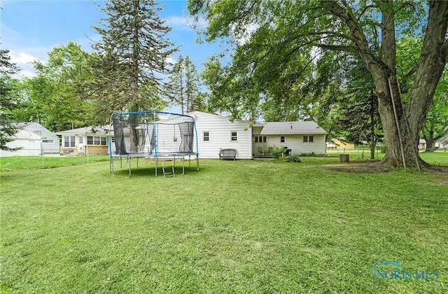 238 Richards Rd, Toledo, OH 43607 - fenced backyard featuring a trampoline