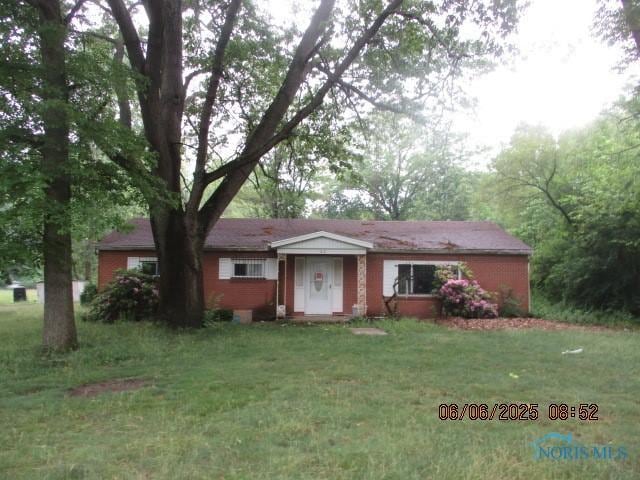 100 S Crissey Rd, Holland, OH 43528 - ranch-style home with a front yard