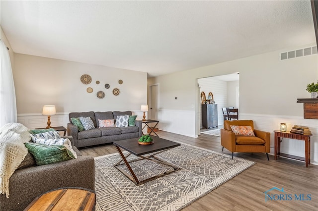 4220 N County Road 33, Tiffin, OH 44883 - living area with a wainscoted wall and wood finished floors