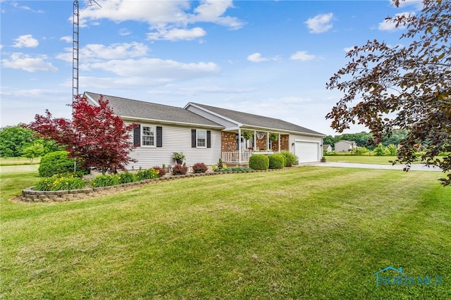 4220 N County Road 33, Tiffin, OH 44883 - ranch-style house featuring concrete driveway, a porch, an attached garage, and a front lawn