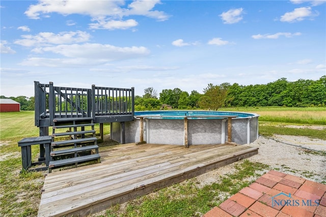 4220 N County Road 33, Tiffin, OH 44883 - wooden terrace featuring an outdoor pool and stairs