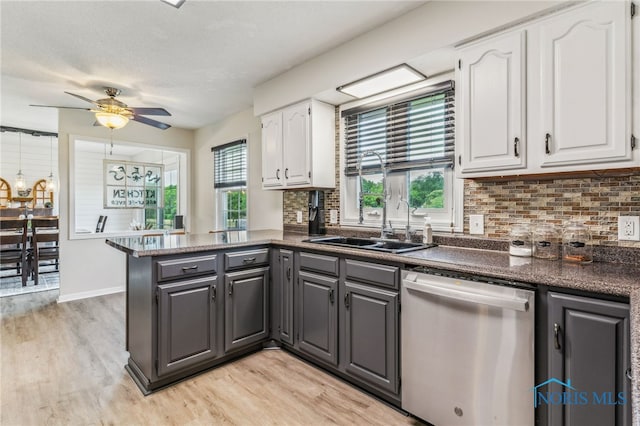 4220 N County Road 33, Tiffin, OH 44883 - kitchen featuring dishwasher, a peninsula, white cabinets, gray cabinets, and dark countertops