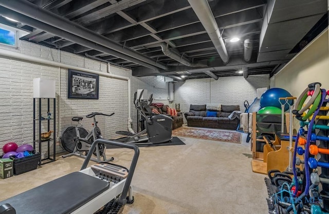 5872 Settlers Ridge Cir, Sylvania, OH 43560 - workout room with carpet and brick wall