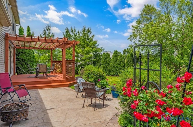 5872 Settlers Ridge Cir, Sylvania, OH 43560 - view of patio / terrace featuring outdoor dining space, a wooden deck, a pergola, and an outdoor fire pit