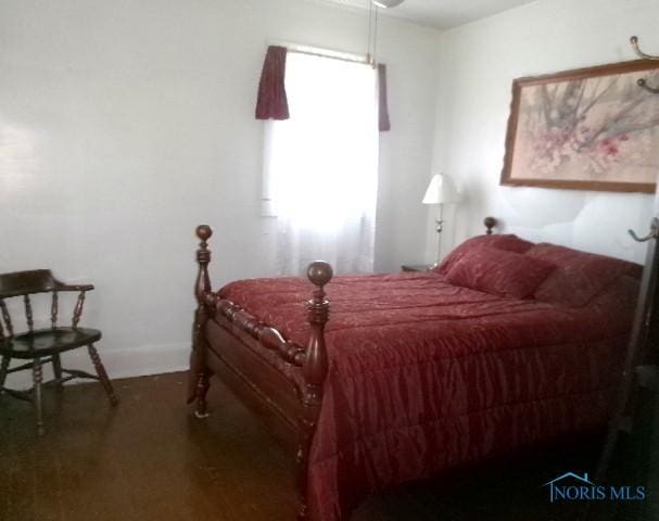 252 N Walnut St, Ottawa, OH 45875 - bedroom featuring wood finished floors