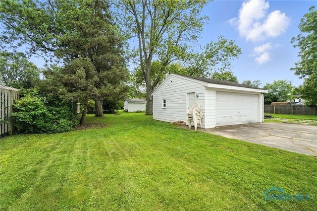 1022 Clough St, Bowling Green, OH 43402 - view of yard with a garage and an outbuilding