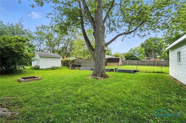 1022 Clough St, Bowling Green, OH 43402 - fenced backyard with a storage shed