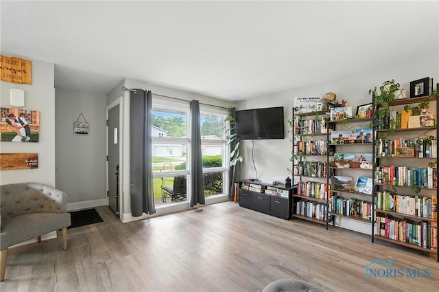 1022 Clough St, Bowling Green, OH 43402 - sitting room featuring wood finished floors and baseboards