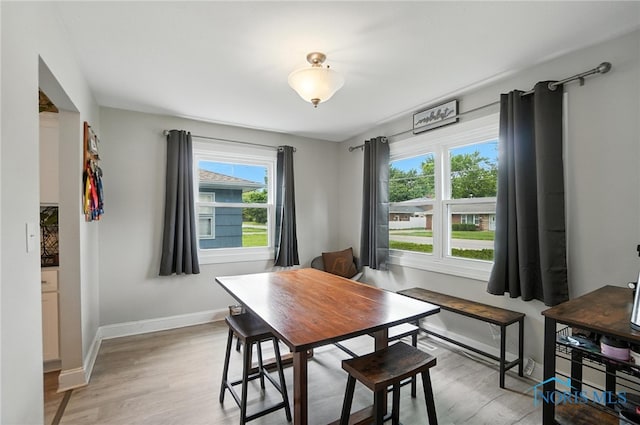 1022 Clough St, Bowling Green, OH 43402 - dining room with light wood-style floors and baseboards