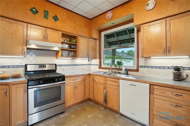 418 S Grove St, Bowling Green, OH 43402 - kitchen featuring white dishwasher, gas stove, under cabinet range hood, and light countertops
