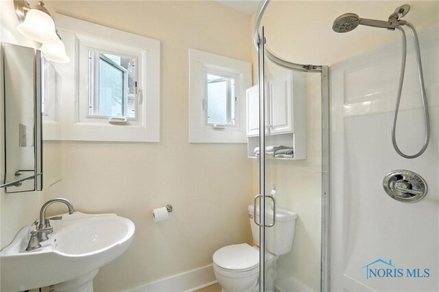 418 S Grove St, Bowling Green, OH 43402 - full bathroom with a shower stall and baseboards