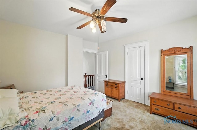418 S Grove St, Bowling Green, OH 43402 - bedroom featuring light colored carpet and a ceiling fan
