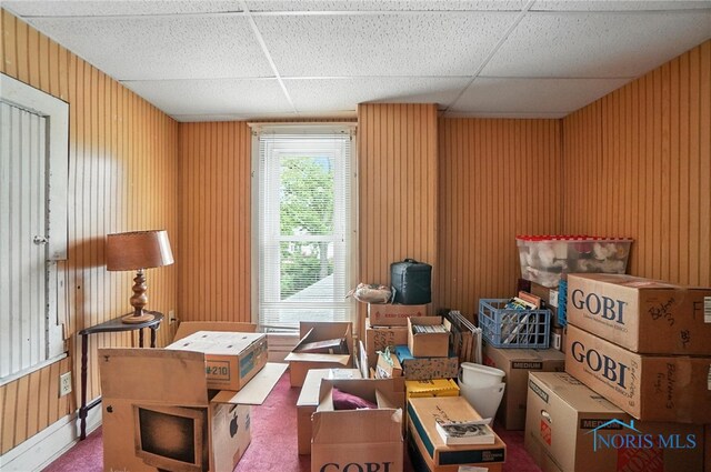 418 S Grove St, Bowling Green, OH 43402 - interior space featuring wood walls and a paneled ceiling