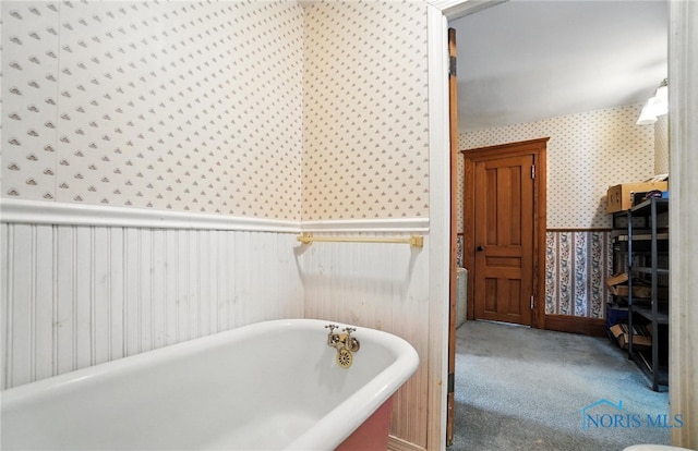 418 S Grove St, Bowling Green, OH 43402 - bathroom featuring wallpapered walls and a freestanding tub