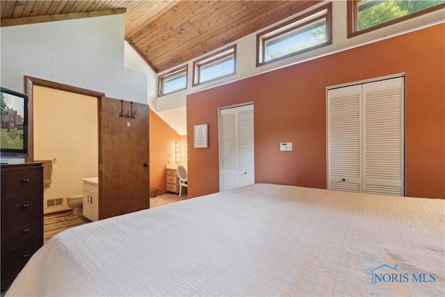 23866 W State Route 579, Curtice, OH 43412 - unfurnished bedroom with high vaulted ceiling, two closets, wood ceiling, and ensuite bathroom