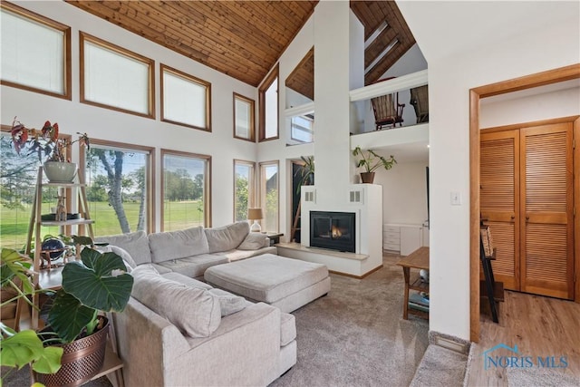 23866 W State Route 579, Curtice, OH 43412 - living room with high vaulted ceiling and a glass covered fireplace