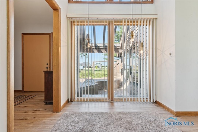 23866 W State Route 579, Curtice, OH 43412 - entryway featuring wood finished floors and arched walkways