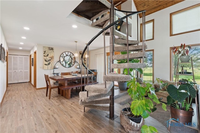 23866 W State Route 579, Curtice, OH 43412 - living area featuring plenty of natural light, light wood finished floors, stairway, and recessed lighting