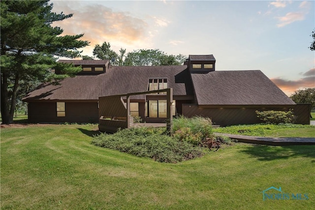 23866 W State Route 579, Curtice, OH 43412 - back of property featuring a yard and a shingled roof