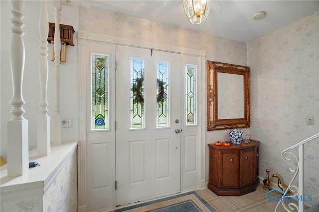 1309 Gettysburg Dr, Maumee, OH 43537 - foyer entrance featuring wallpapered walls and light tile patterned floors
