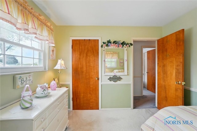 1309 Gettysburg Dr, Maumee, OH 43537 - bedroom featuring light carpet and baseboards