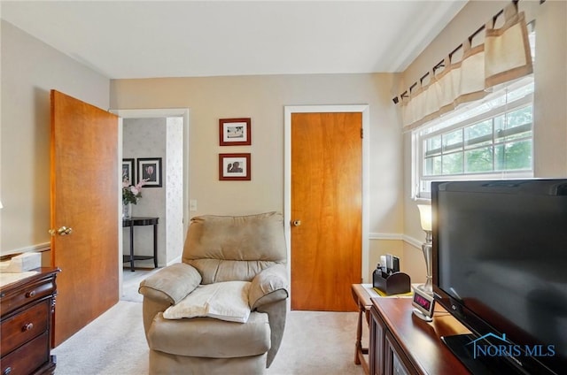 1309 Gettysburg Dr, Maumee, OH 43537 - living area featuring light colored carpet and an office area