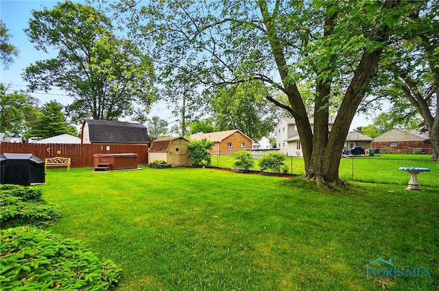 1309 Gettysburg Dr, Maumee, OH 43537 - fenced backyard featuring a shed
