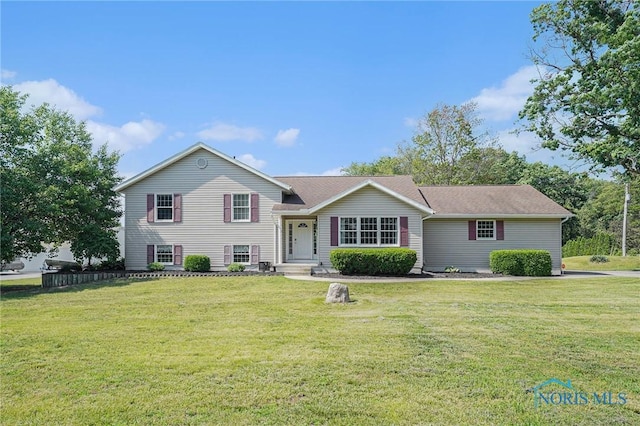 9064 Frankfort Rd, Holland, OH 43528 - view of front of house featuring a front lawn