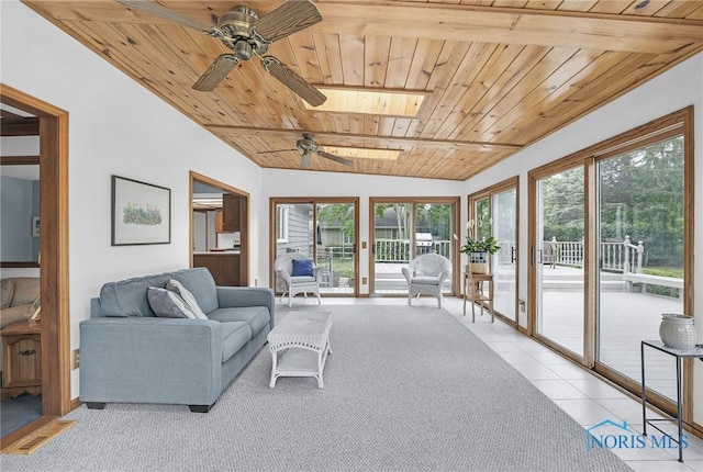 7040 Country Creek Rd, Maumee, OH 43537 - living area featuring a ceiling fan, wood ceiling, lofted ceiling, and light tile patterned flooring
