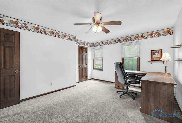 7040 Country Creek Rd, Maumee, OH 43537 - carpeted home office with a ceiling fan and baseboards